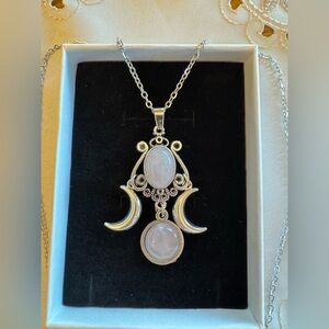 Silver colored moon necklace